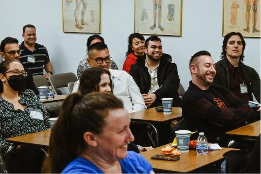 Students attending a classroom session at NYCHP